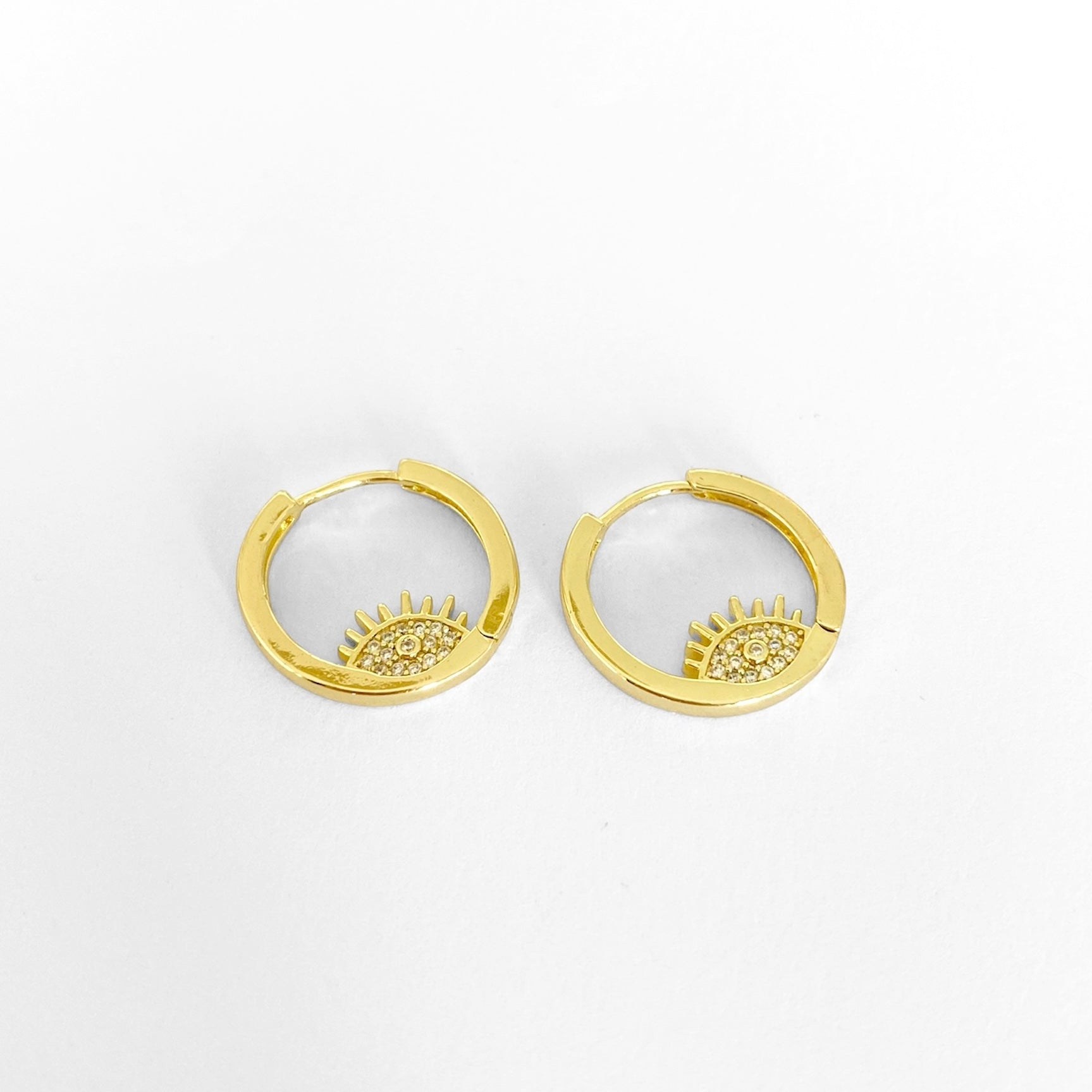 Huggies ojo zirconia doradas