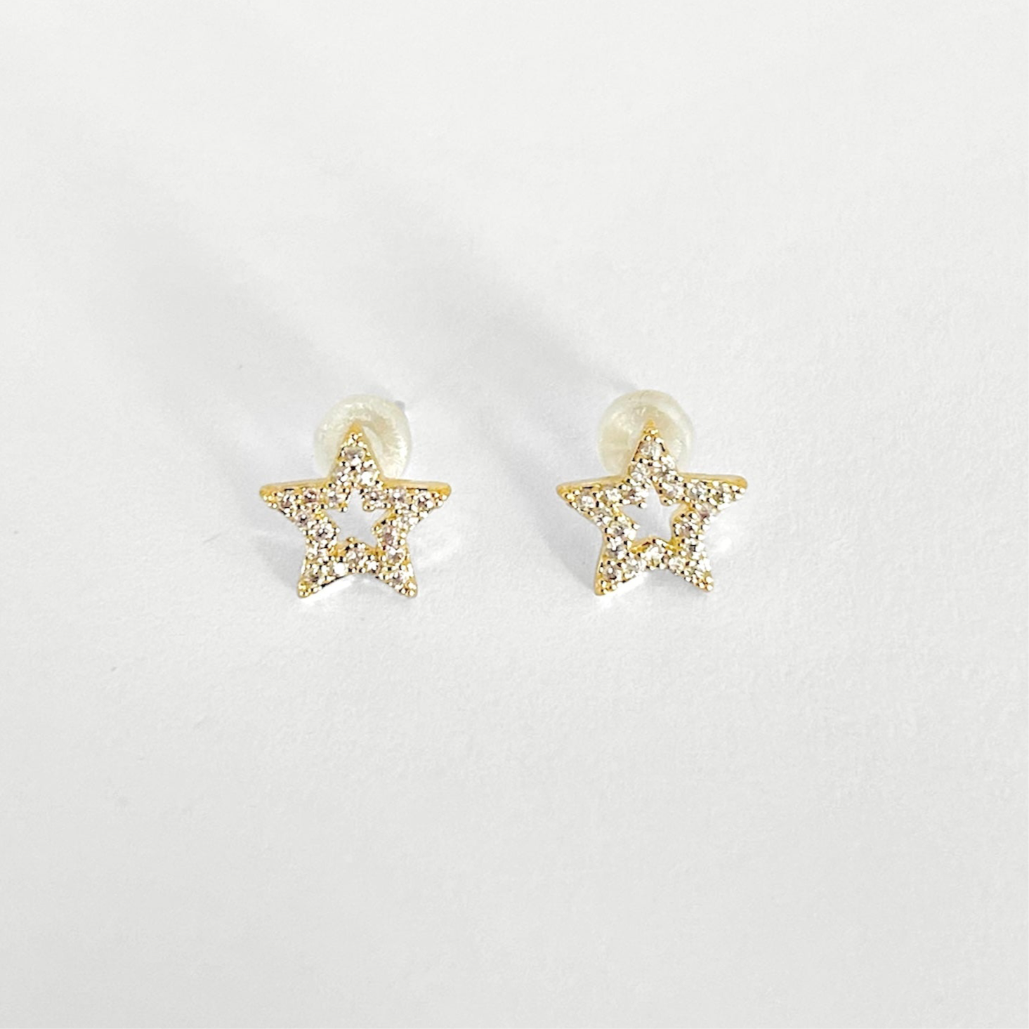 Broqueles silueta estrella zirc