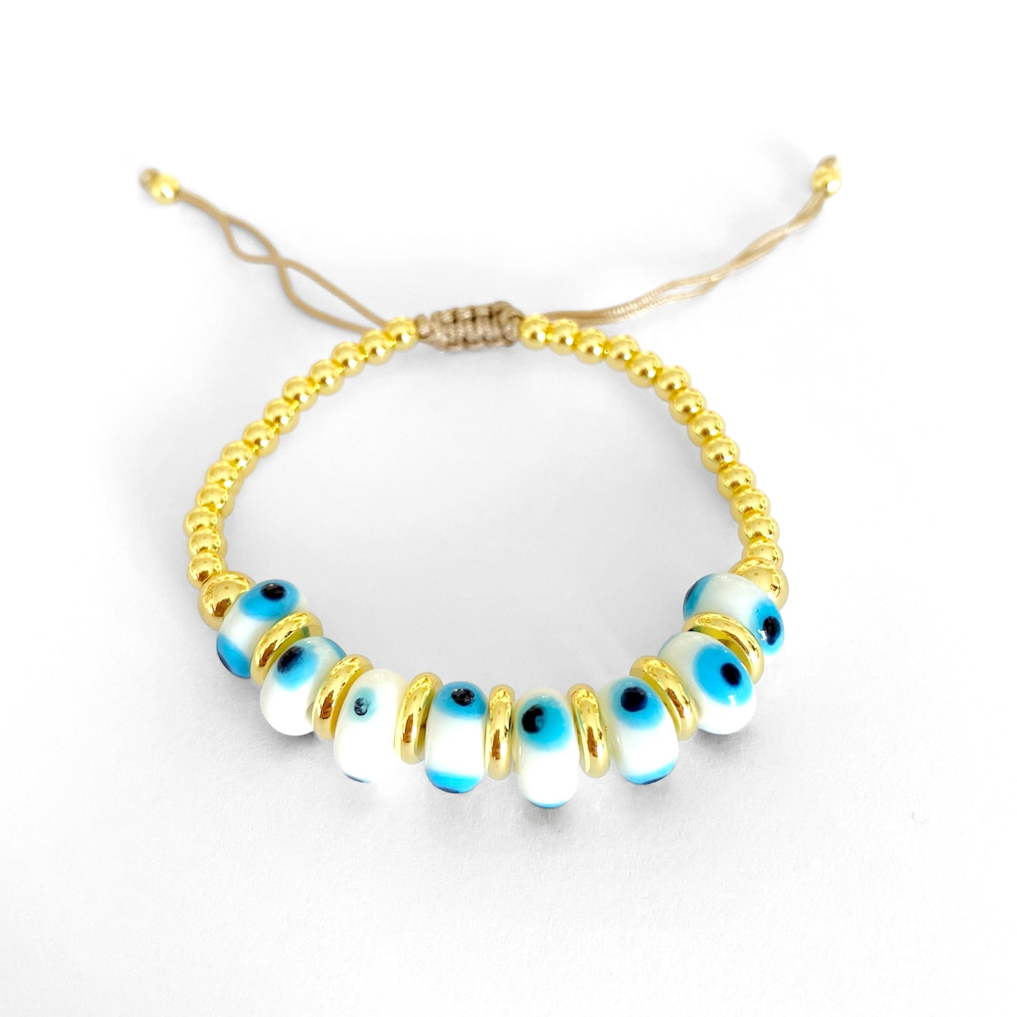 Pulsera white eyes dorada