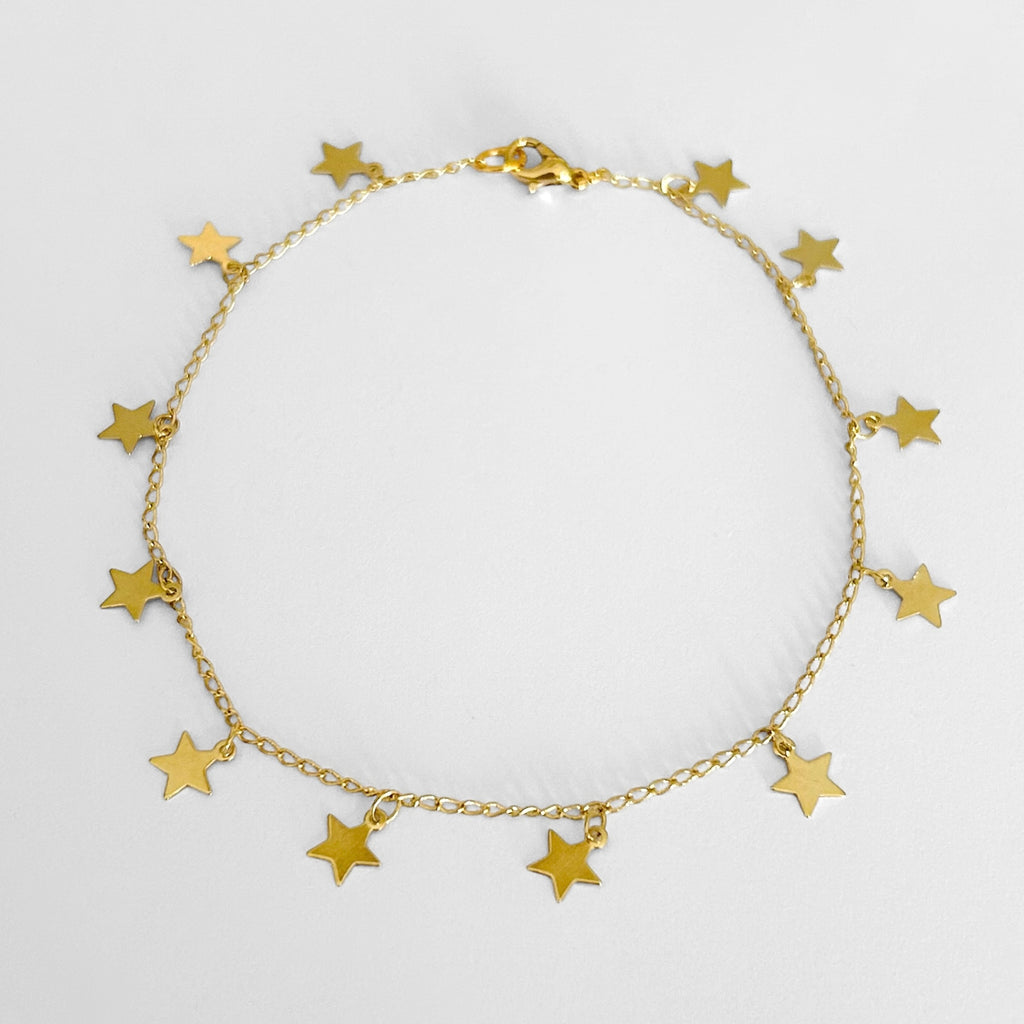 Tobillera estrellas doradas