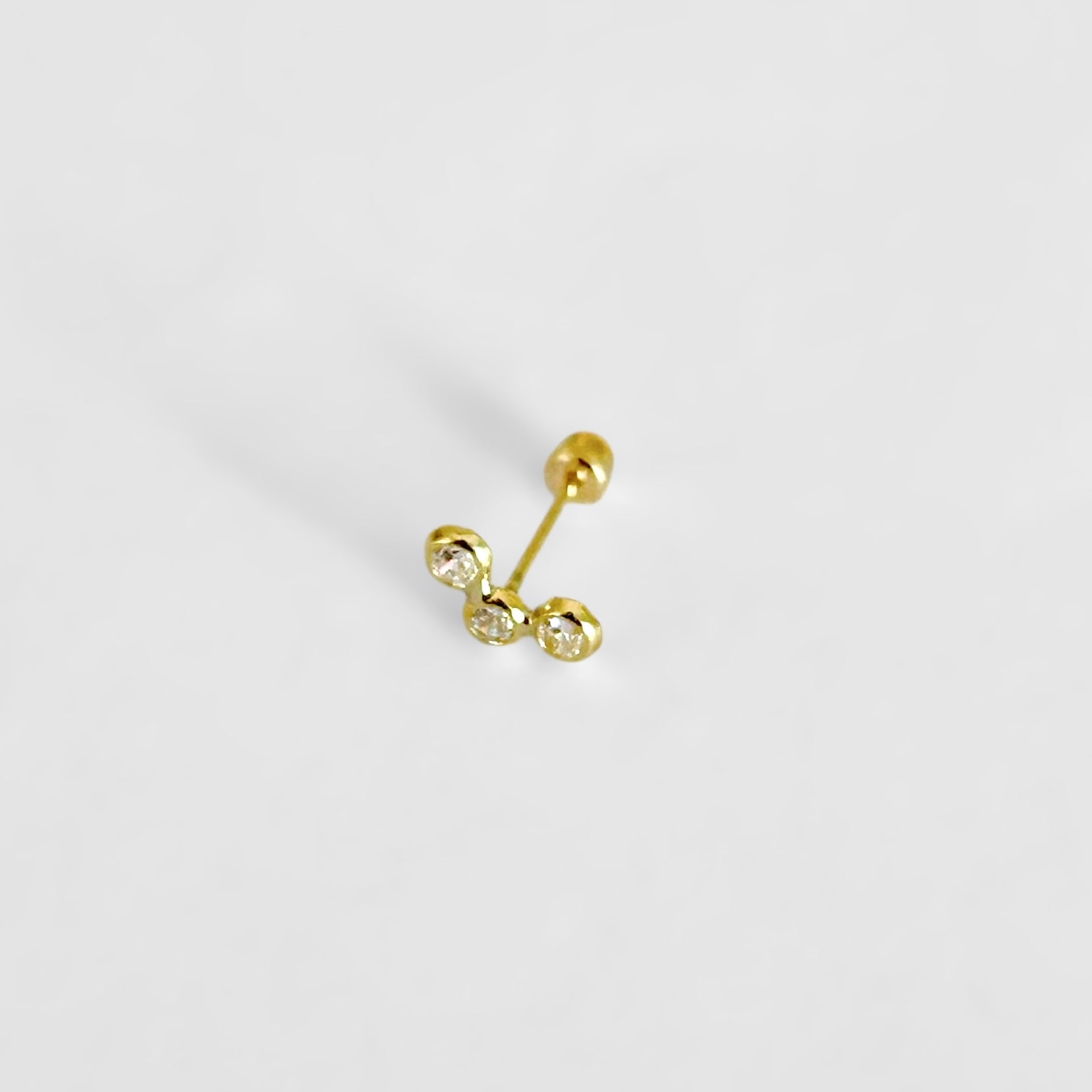 Piercing arco 3 zirconias oro10k