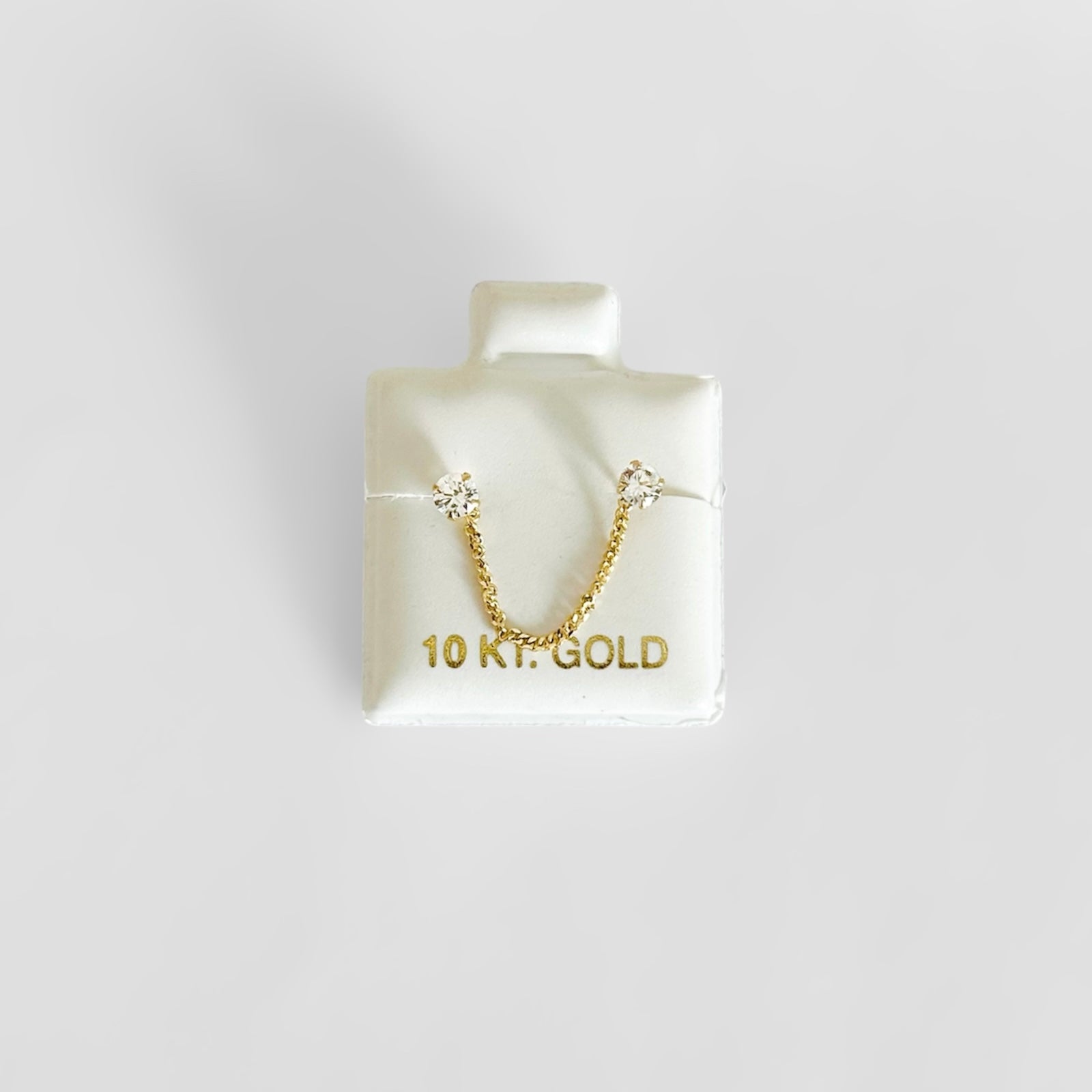 Piercing Cadena zirconias Oro10K