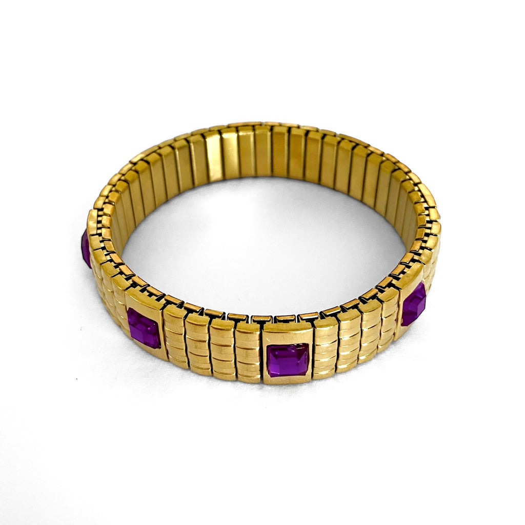 Pulsera dorada piedras moradas