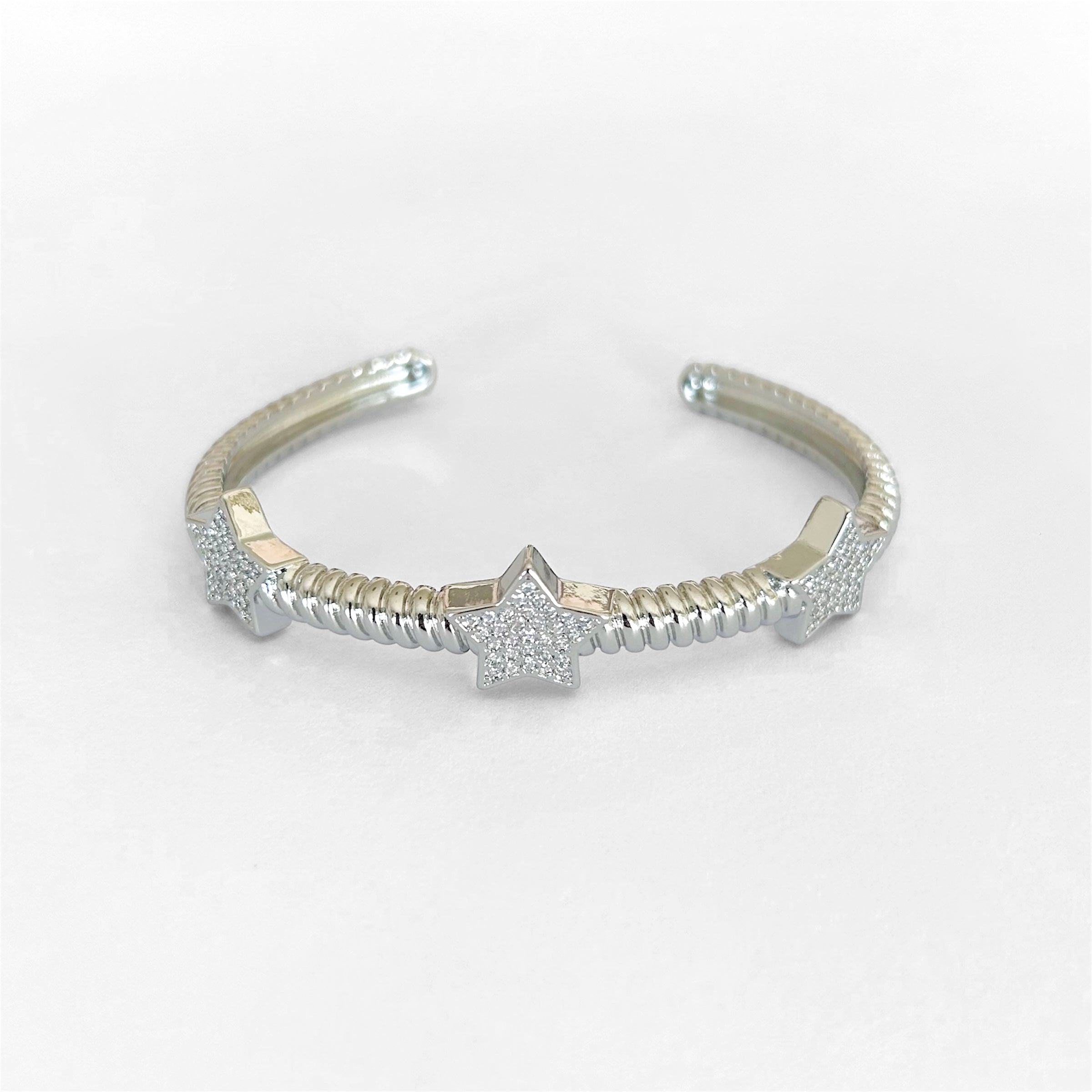 Brazalete plata estrellas zirc