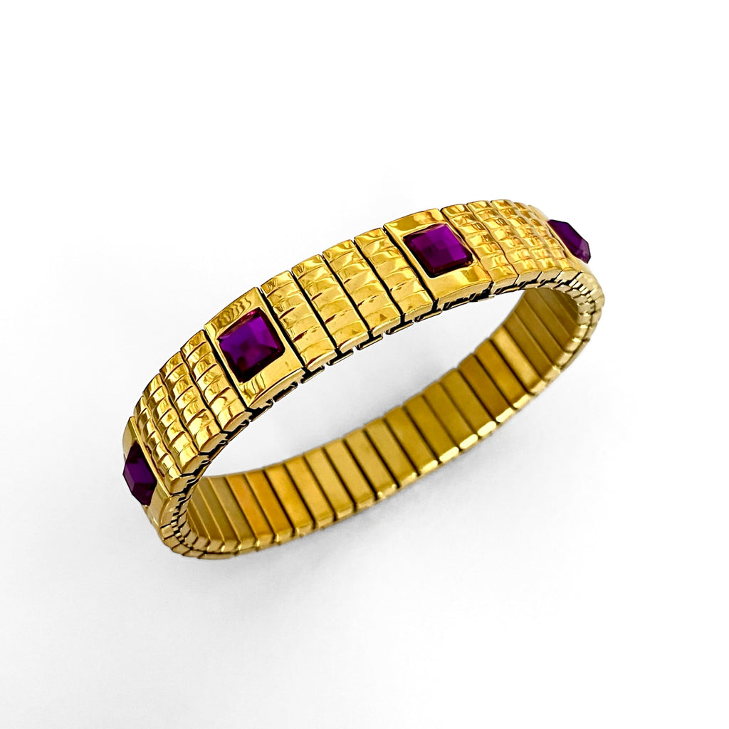 Pulsera dorada piedras moradas