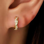 Piercing arracada zirc torcida