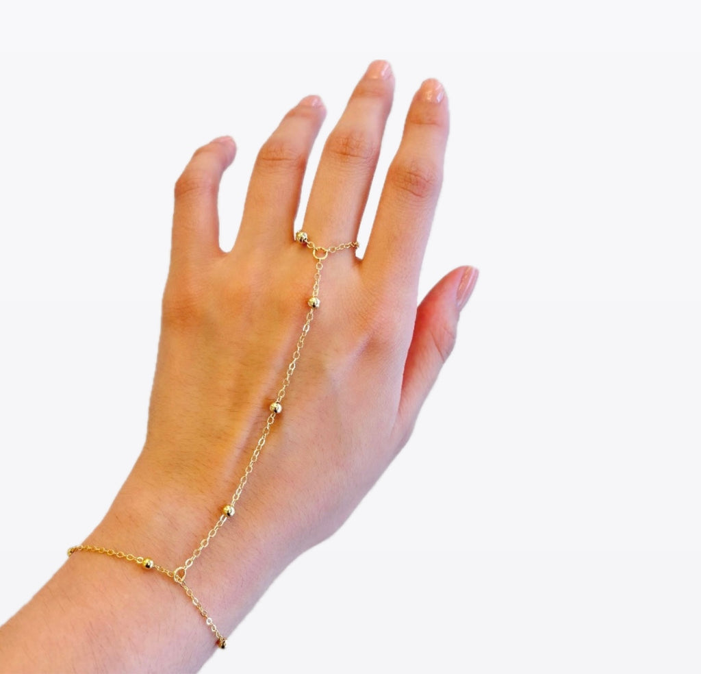Pulsera anillo bolitas doradas