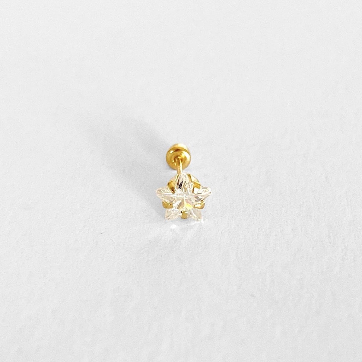 Piercing estrella zirc oro 10K