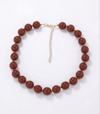 Collar Ginebra café