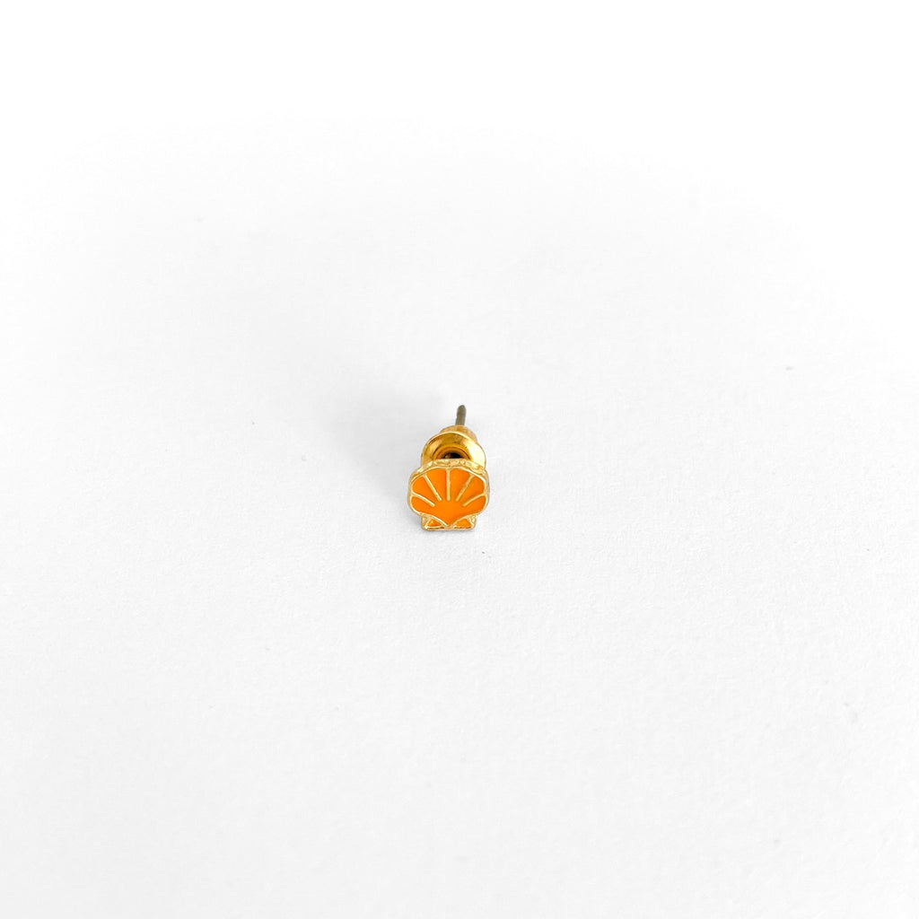 Piercing concha naranja